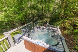 Our large hot tub seats 6-7 and overlooks the waterfall and creek 