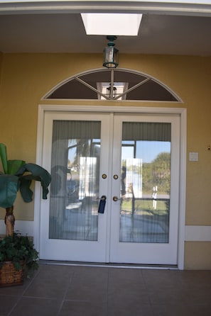 Welcome to your vacation home! Double doors at the front of the home