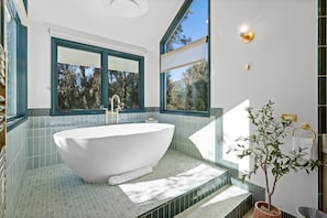 Step into serenity—natural light and elegant finishes set the scene.