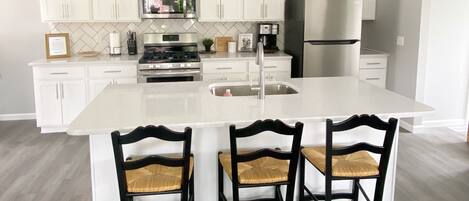 Beautiful brand new kitchen stocked with all the essentials to cook at home 