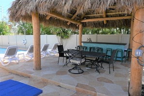 Tiki hut with 10' bar and stools