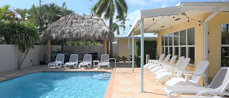 Pool, New Tiki hut, tiki bar and Lanai with seating