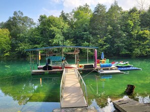Aug 15, 2022.  Newer photo of dock with additional PWC ports and furniture.