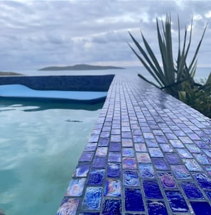 Unforgettable Views from the Cobalt Blue Iridescent Glass Tiled Swimming Pool 