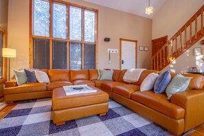 Cozy living room with wood-burning fireplace