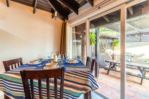 Lofty Dining Area of the Apartment in Noord Aruba - 4 Persons Dining - Artfully arranged table settings for a touch of elegance - Outside Views