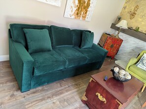  Sofa that opens out into a Queen Size Sofa bed. (Center table is on wheels)