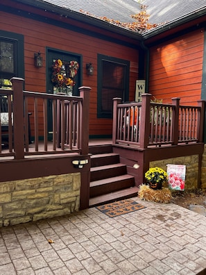 Welcoming front entrance with rocking chairs for morning coffee.  