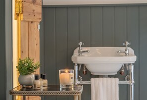 1 Church Cottages: First floor bedroom one with free-standing, wash basin and separate WC