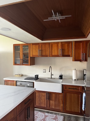 Beautifully and recently remodeled fully equipped kitchen.