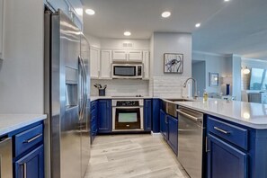 The kitchen is equipped with all you need to prepare meals from the land or sea