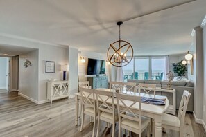 Dining table seats eight plus 3 barstools at the island