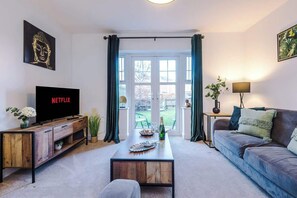 Open plan Living Room benefitting from a sofa bed and Smart TV with Netflix.