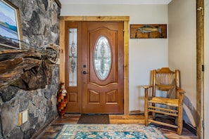 Front door entryway. Powder room to the right.