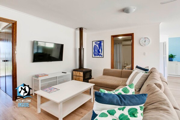 Living room with combustion wood heater