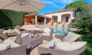 Comfortable lounge by the private pool 