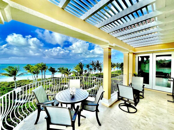 Private balcony overlooks the beach