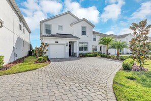 House exterior w/ driveway.