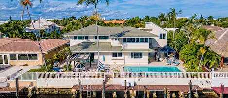Newly remodeled 5 bedroom + loft (6th bedroom) waterfront home walkable to beach
