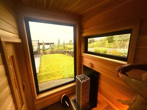 Architecturally designed sauna/cold plunge outbuilding with mountain views
