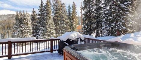 Private hot tub on deck with mountain views