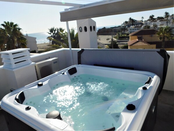 Roof top Terrace with Sofa seating and jacuzzi Hot Tub with great views  