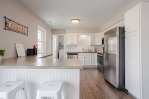 Spacious kitchen with new appliances