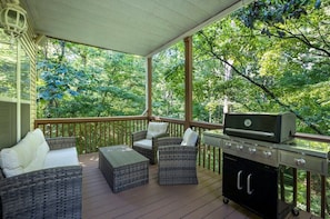 Our home features THREE back decks, all complete with cozy furnishings.