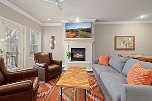 We have two living rooms centered around fireplaces with cozy seating.