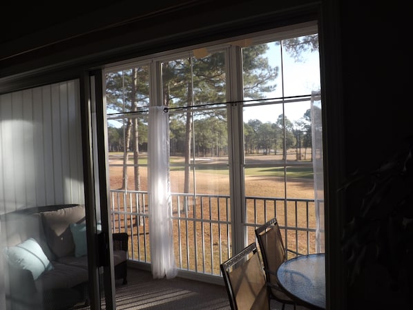 Enclosed patio view overlooking golf course