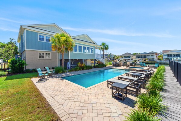 Take a cool dip in the pool after a day at the beach.