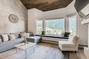 Large sectional couch, bench seating to soak in the views!