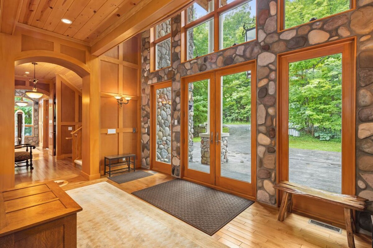 One-of-a-Kind Lakefront Torch Lake Lodge – 4 Floors of Luxury
