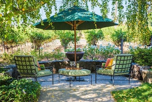 Seating at the front of the house with views of the vineyards & Mt. St. Helena.