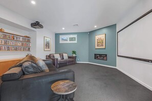 Cinema room with gas log fire