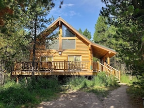 Surrounded by lush pine trees, our cabin is conveniently close to Henry Lake and Yellowstone National Park.