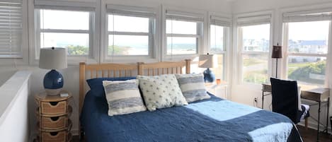 Fourth level bedroom with king bed, desk,  smart TV and amazing ocean views 