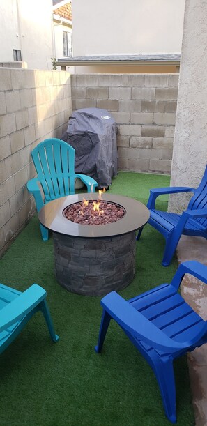 Relax and unwind around your private gas fire pit