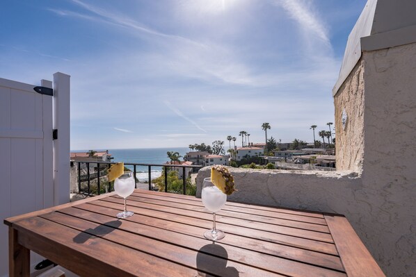 View from the roof top deck. 3min walk down to the sand and beach trail