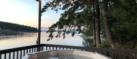 Relax in the private hot tub overlooking the gorgeous bay views.