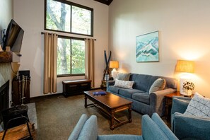Living Room has incredible view out over the mountain side
