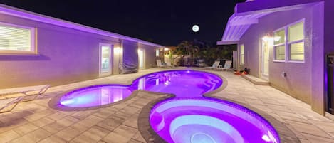 Full Moon over large Heated Salt Water Pool and Spa at AMI Beach Lagoon