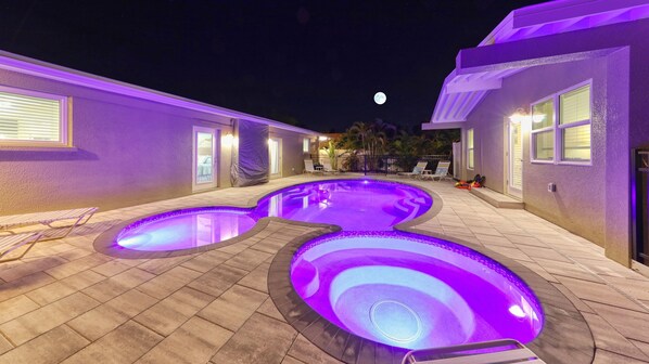 Full Moon over large Heated Salt Water Pool and Spa at AMI Beach Lagoon