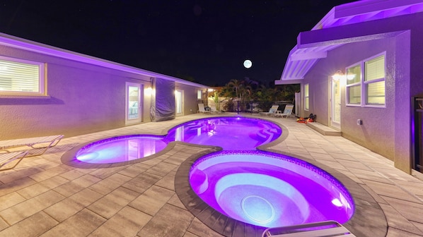 Full Moon over large Heated Salt Water Pool and Spa at AMI Beach Lagoon