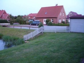 External view of the building. holiday house in front of the water