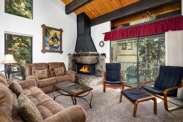 Living Room with Gas Fireplace and Deck Access
