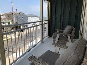 Enjoy your coffee on the top front deck while watching the waves roll in. 