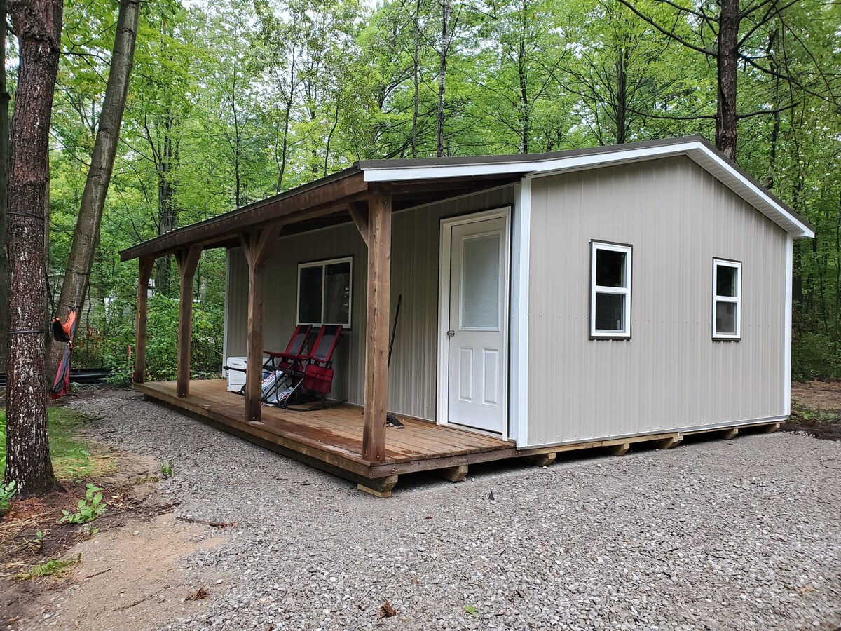 Great camping location will full hook up and tiny guest house!