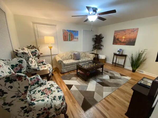 Nicely Furnished Living Room with new queen sleeper sofa.