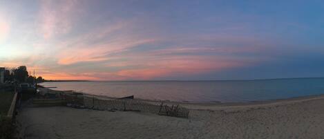 Beautiful beach with sunset and moonrise in one skyline!